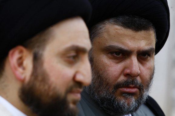 Iraqi Shi'ite cleric Moqtada al-Sadr and Ammar al-Hakim, leader of the Islamic Supreme Council of Iraq (ISCI), hold a news conference in Najaf