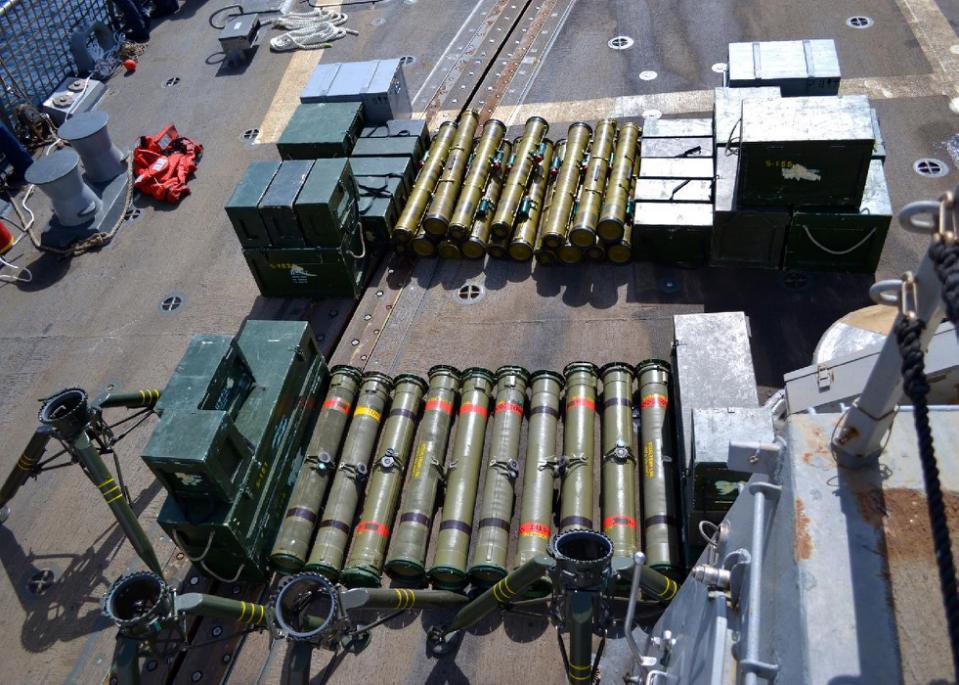 This Sept. 27, 2015 photo released by the U.S. Navy on Sept. 30, 2015, shows weapons and equipment confiscated from a dhow, aboard the deck of USS Forrest Sherman. A ship carrying illicit arms believed to be from Iran was intercepted last week off the southern Arabian Peninsula by a member of a U.S.-backed naval coalition and was not registered with any country, the U.S. Navy said Wednesday. The American description of the ships seizure conflicted in some instances with an earlier account provided by a separate Saudi-led coalition battling Yemens Shiite rebels, which claimed it had foiled the smuggling attempt. (Combined Maritime Forces photo via AP)