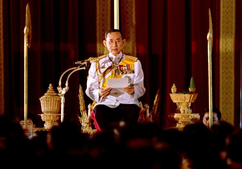 File photo of Thai King Bhumibol Adulyadej reading a statement convening Parliament in Bangkok